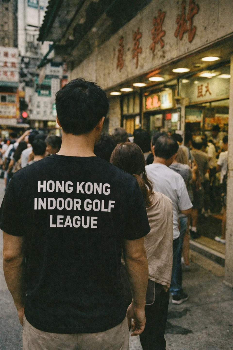 Hong Kong Indoor Golf League shirt worn in a Hong Kong street